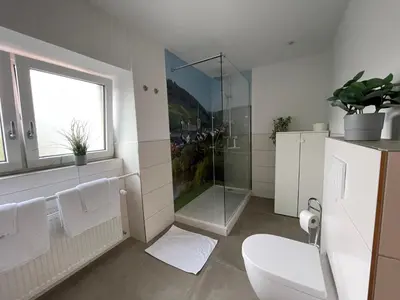 Ein Badezimmer in der Unterkunft Gaestehaus Kön - Fewo Farfalle