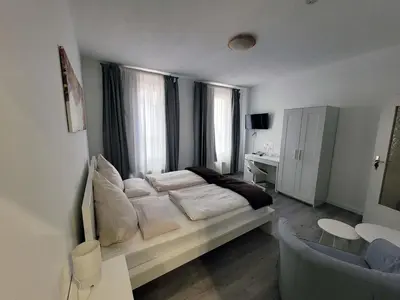 Ein Bett oder Betten in einem Zimmer der Unterkunft Hotel Restaurant Adria Kroatien