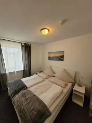 Ein Bett oder Betten in einem Zimmer der Unterkunft Hotel Restaurant Adria Kroatien