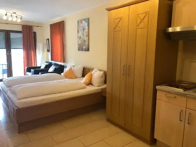 Ein Bett oder Betten in einem Zimmer der Unterkunft Hotel Berghof