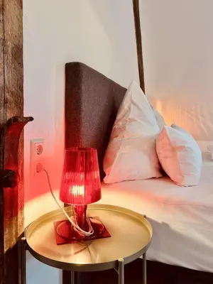 Ein Bett oder Betten in einem Zimmer der Unterkunft Hotel Villa Vie Cochem