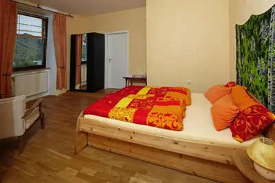Ein Bett oder Betten in einem Zimmer der Unterkunft Pension Röhrig