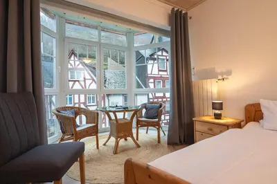 Ein Bett oder Betten in einem Zimmer der Unterkunft Hotel Ursula