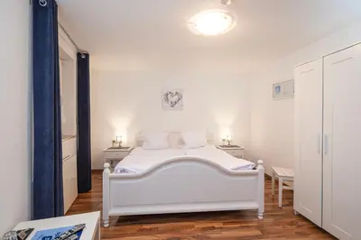 Ein Bett oder Betten in einem Zimmer der Unterkunft Hotel Ursula