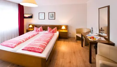Ein Bett oder Betten in einem Zimmer der Unterkunft Hotel & Restaurant Krone
