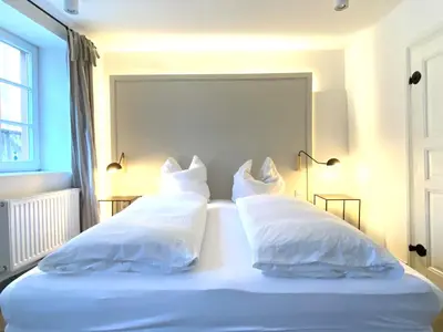 Ein Bett oder Betten in einem Zimmer der Unterkunft Living in History - Modern Country Cottage