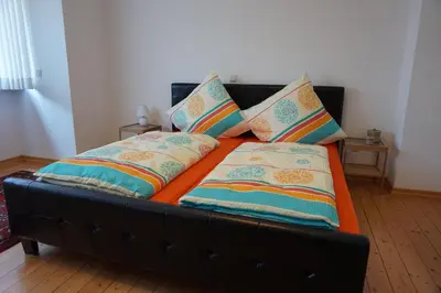 Ein Bett oder Betten in einem Zimmer der Unterkunft Citynahe Wohnung Festung Ehrenbreitstein 65m² mit großem Garten