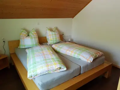 Ein Bett oder Betten in einem Zimmer der Unterkunft Ferienwohnung Kittel