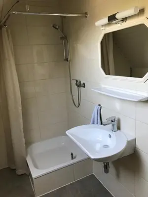 Ein Badezimmer in der Unterkunft Haus Irmgard