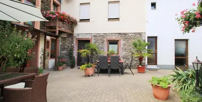 Ein Garten an der Unterkunft Fewo Spiaggia - Gästehaus Kön