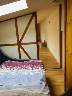 Ein Bett oder Betten in einem Zimmer der Unterkunft Ferienwohnung am Nürburgring/Wintersport Arft