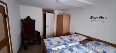 Ein Bett oder Betten in einem Zimmer der Unterkunft Gästehaus Kretschmann