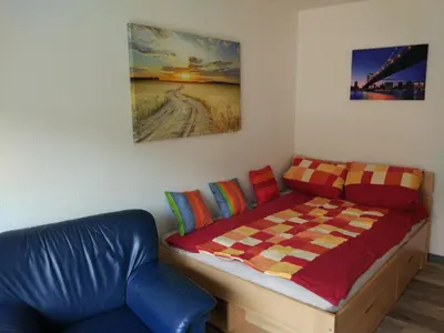 Ein Bett oder Betten in einem Zimmer der Unterkunft Ferienappartement Trier