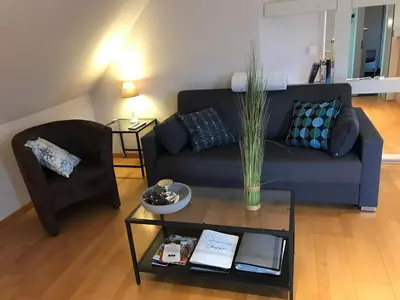 Ein Sitzbereich in der Unterkunft Ferienwohnung Laurent