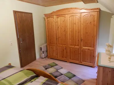 Ein Bett oder Betten in einem Zimmer der Unterkunft Ferienhaus Greta