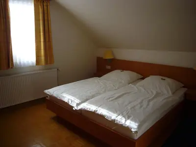 Ein Bett oder Betten in einem Zimmer der Unterkunft Hotel Deutsches Haus