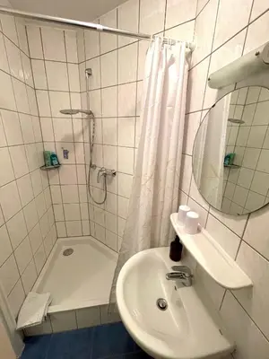 Ein Badezimmer in der Unterkunft Fewo TRINA