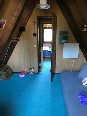 Ein Bett oder Betten in einem Zimmer der Unterkunft Eifelwolke