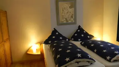 Ein Bett oder Betten in einem Zimmer der Unterkunft Gastehaus am Calmont