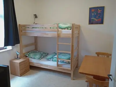 Ein Bett oder Betten in einem Zimmer der Unterkunft Hotel Kremer