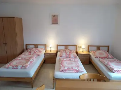 Ein Bett oder Betten in einem Zimmer der Unterkunft Hotel Kremer