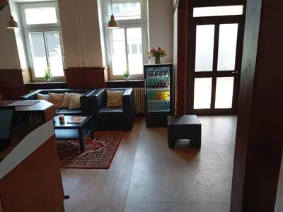 Ein Sitzbereich in der Unterkunft Hotel Kremer