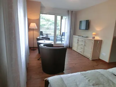 Ein Bett oder Betten in einem Zimmer der Unterkunft Ferienweingut Hirschen Schulstraße