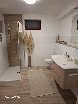 Ein Badezimmer in der Unterkunft FeWo Fortysix