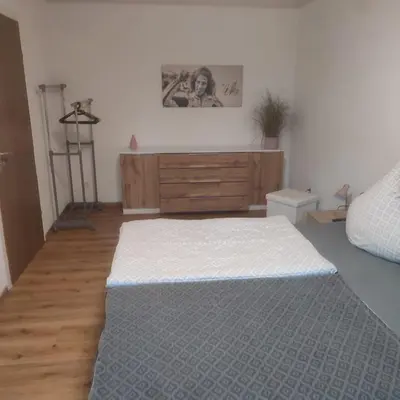 Ein Bett oder Betten in einem Zimmer der Unterkunft FeWo Fortysix
