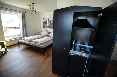 Ein Bett oder Betten in einem Zimmer der Unterkunft Nürburgring Aparts