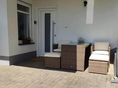 Ein Sitzbereich in der Unterkunft Ferienwohnung Elsbeere