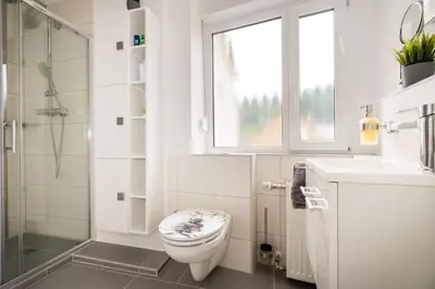 Ein Badezimmer in der Unterkunft FeWo-tt 2