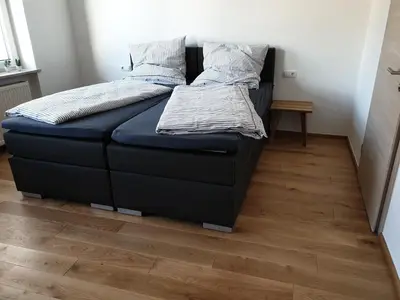 Ein Bett oder Betten in einem Zimmer der Unterkunft Beim Hooch. Egon