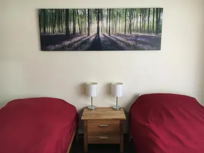 Ein Bett oder Betten in einem Zimmer der Unterkunft Ferienwohnung Helga