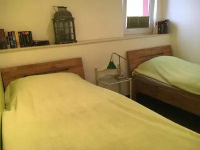 Ein Bett oder Betten in einem Zimmer der Unterkunft Ferienwohnung Helga