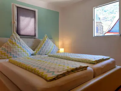 Ein Bett oder Betten in einem Zimmer der Unterkunft Anna´s Häuschen