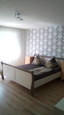 Ein Bett oder Betten in einem Zimmer der Unterkunft mosel ferienwohnung