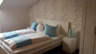 Ein Bett oder Betten in einem Zimmer der Unterkunft Hotel-Restaurant Sonnenhof