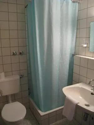 Ein Badezimmer in der Unterkunft Hotel-Restaurant Sonnenhof