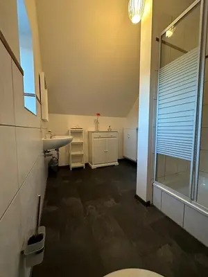 Ein Badezimmer in der Unterkunft Ferienwohnung FENJA