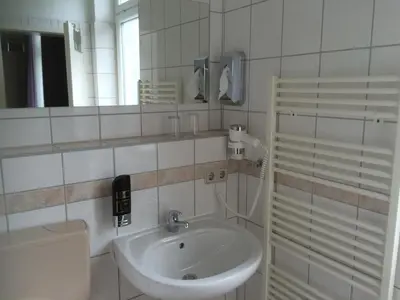 Ein Badezimmer in der Unterkunft Hotel Zwei Mohren