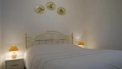 Ein Bett oder Betten in einem Zimmer der Unterkunft Vulkaneifel-Ferienwohnungen am Felsenpfad