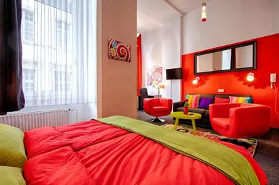 Ein Bett oder Betten in einem Zimmer der Unterkunft Aparthotel am Münzplatz