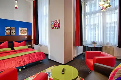 Ein Bett oder Betten in einem Zimmer der Unterkunft Aparthotel am Münzplatz