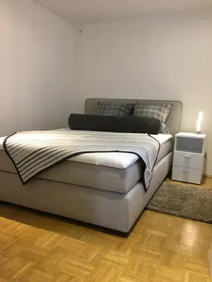 Ein Bett oder Betten in einem Zimmer der Unterkunft Ferienwohnung Helmut Beisiegel