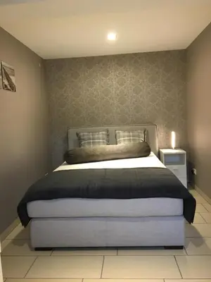 Ein Bett oder Betten in einem Zimmer der Unterkunft Ferienwohnung Helmut Beisiegel
