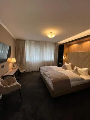 Ein Bett oder Betten in einem Zimmer der Unterkunft Hotel Zum Fährturm