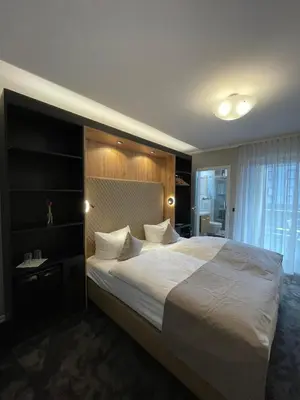 Ein Bett oder Betten in einem Zimmer der Unterkunft Hotel Zum Fährturm