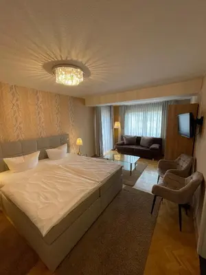 Ein Bett oder Betten in einem Zimmer der Unterkunft Hotel Zum Fährturm