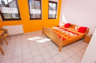 Ein Bett oder Betten in einem Zimmer der Unterkunft Weingut Christian Bucher